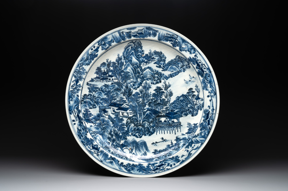 A massive Chinese blue and white 'landscape' dish, 19th C.