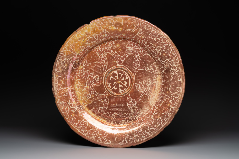 A massive Spanish Hispano-Moresque lustreware 'double eagle' dish, Manises, early 17th C.