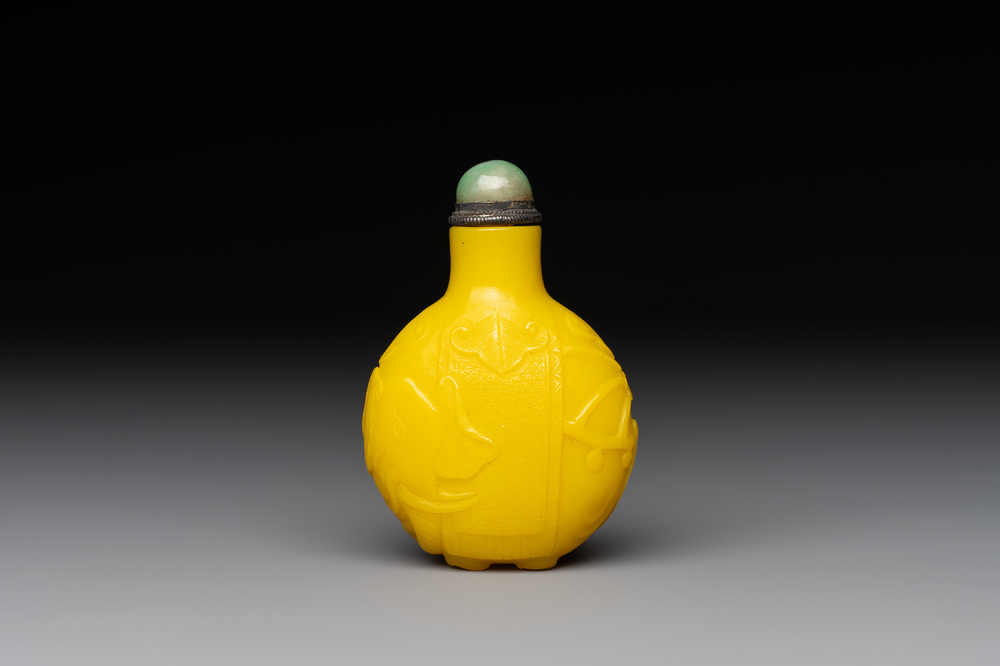 A Chinese yellow Peking glass 'elephant' snuff bottle, Xing You Heng Tang 行有恆堂 mark, 19th C.
