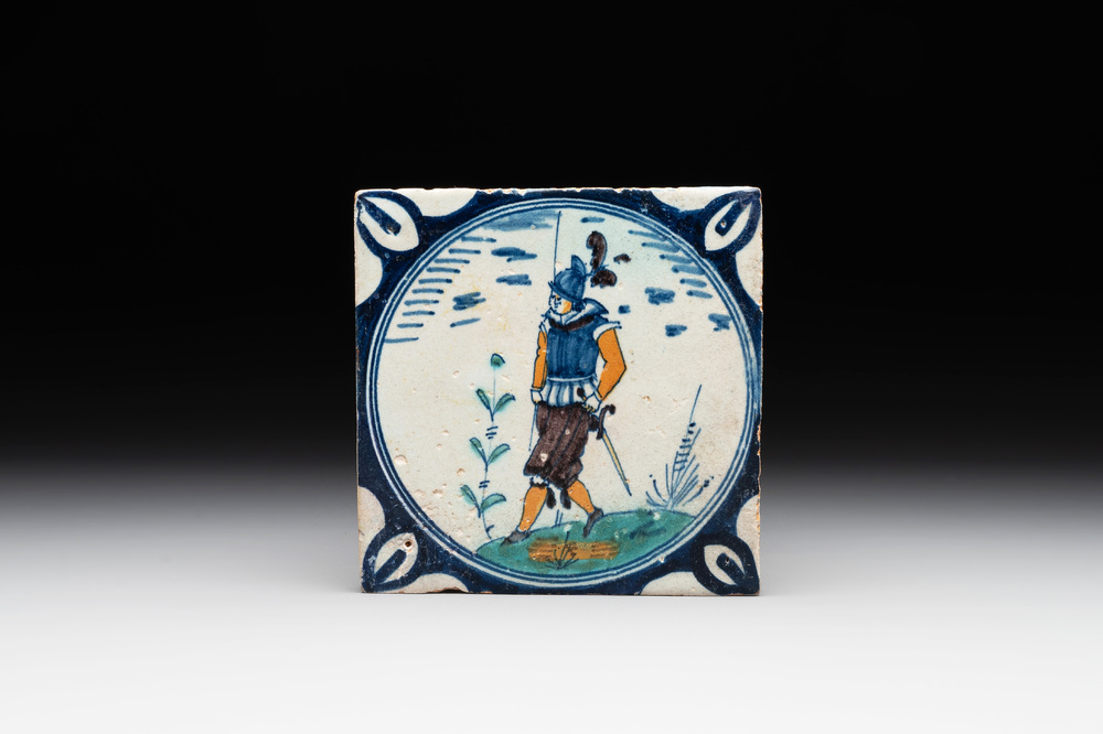 A polychrome Dutch Delft maiolica 'medallion' 'soldier' tile, late 16th C.