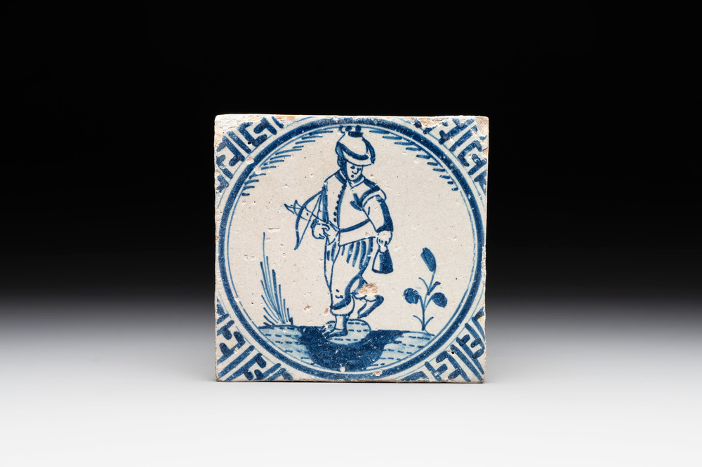 A blue and white Rotterdam 'crown' 'bowman' tile, 17th C.