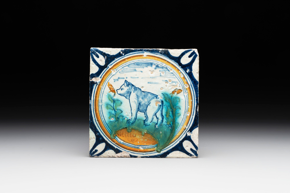 A polychrome Dutch Delft maiolica 'medallion' 'bear' tile, late 16th C.