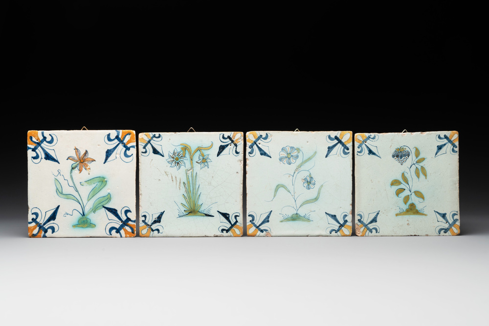 Four polychrome Dutch Delft 'flower' tiles, 17th C.