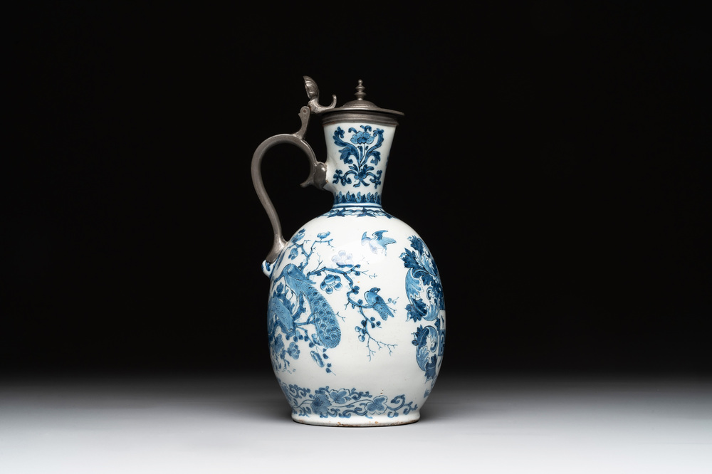 A Dutch Delft blue and white pewter-mounted armorial jug, late 17th C.
