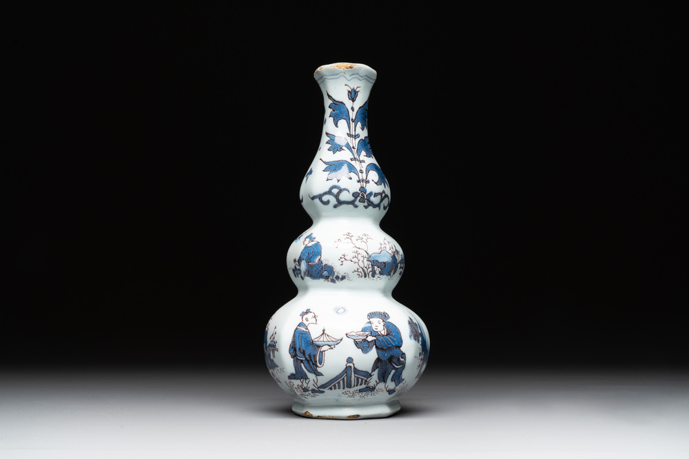 A Dutch Delft blue, white and manganese chinoiserie triple gourd vase, late 17th C.