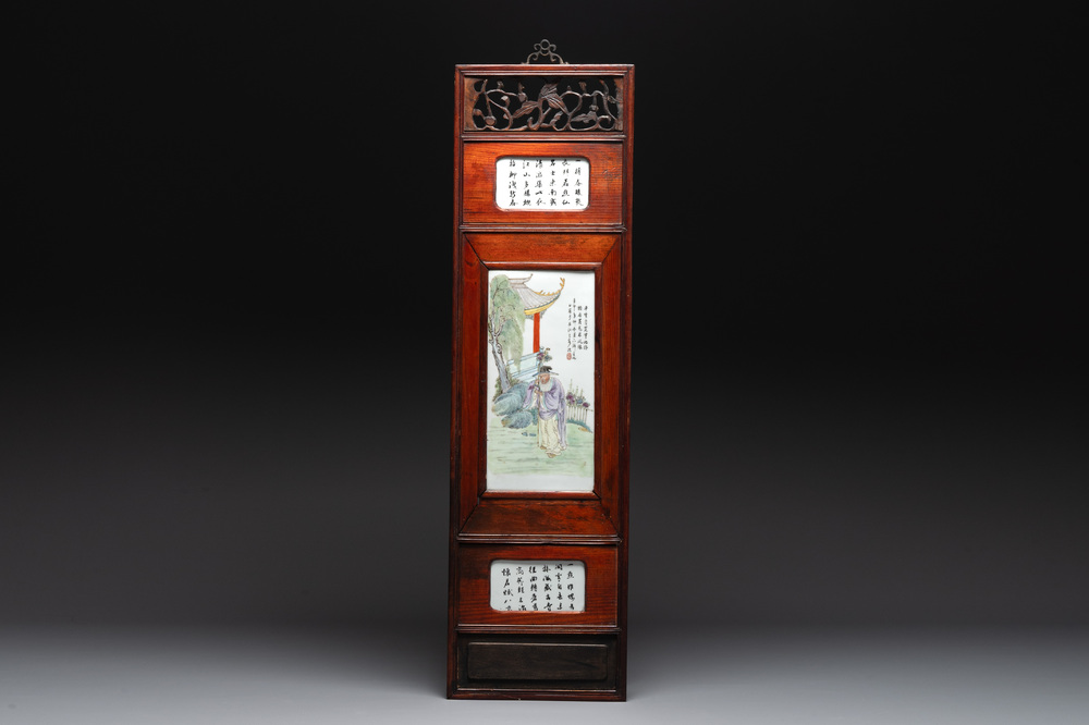 A Chinese carved wooden panel with famille rose Wang Qi 王琦-style plaques, dated 1932