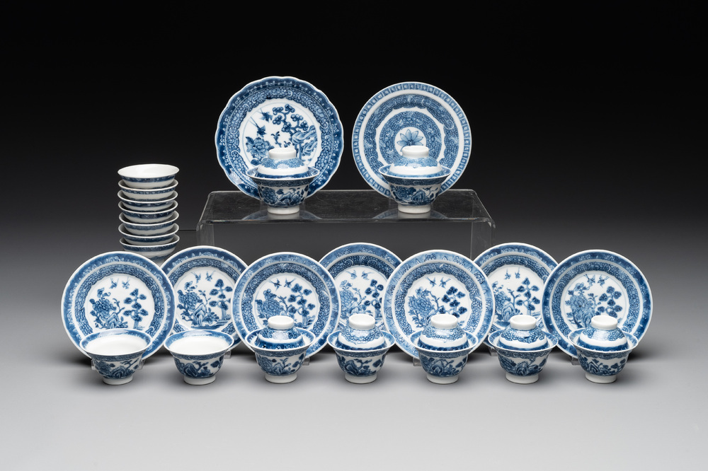 A collection of 32 pieces Chinese blue and white cups, saucers and covers with floral design, Qianlong