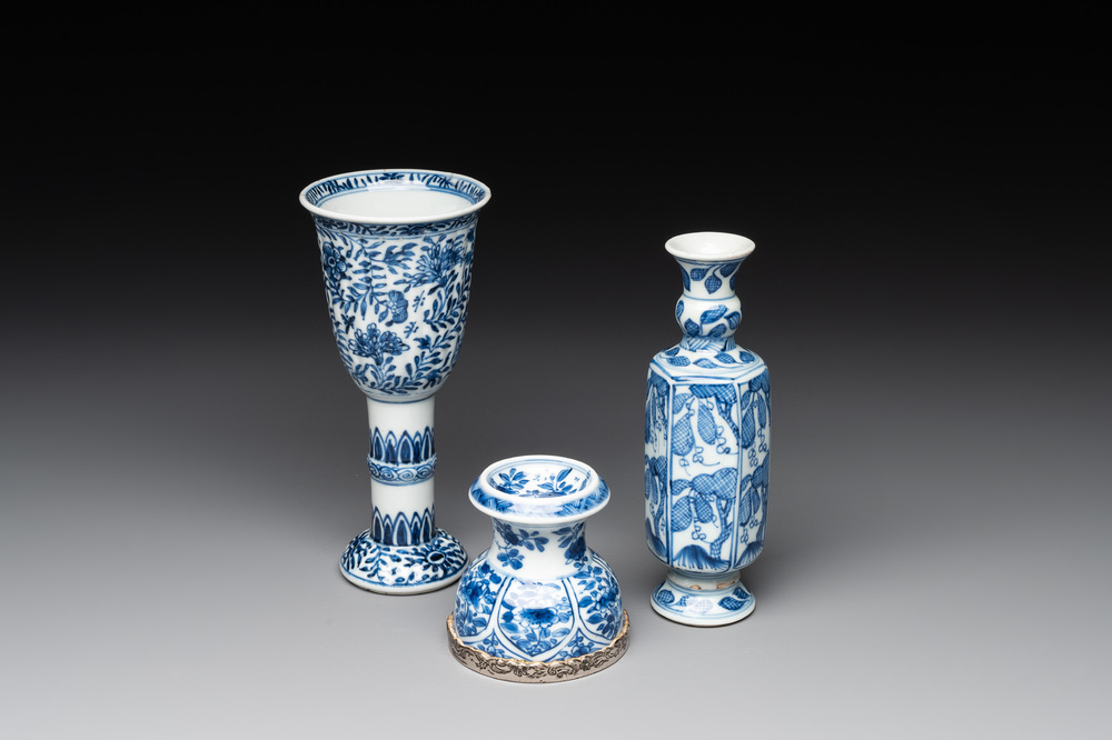 A Chinese blue and white goblet, a salt and a vase, Kangxi