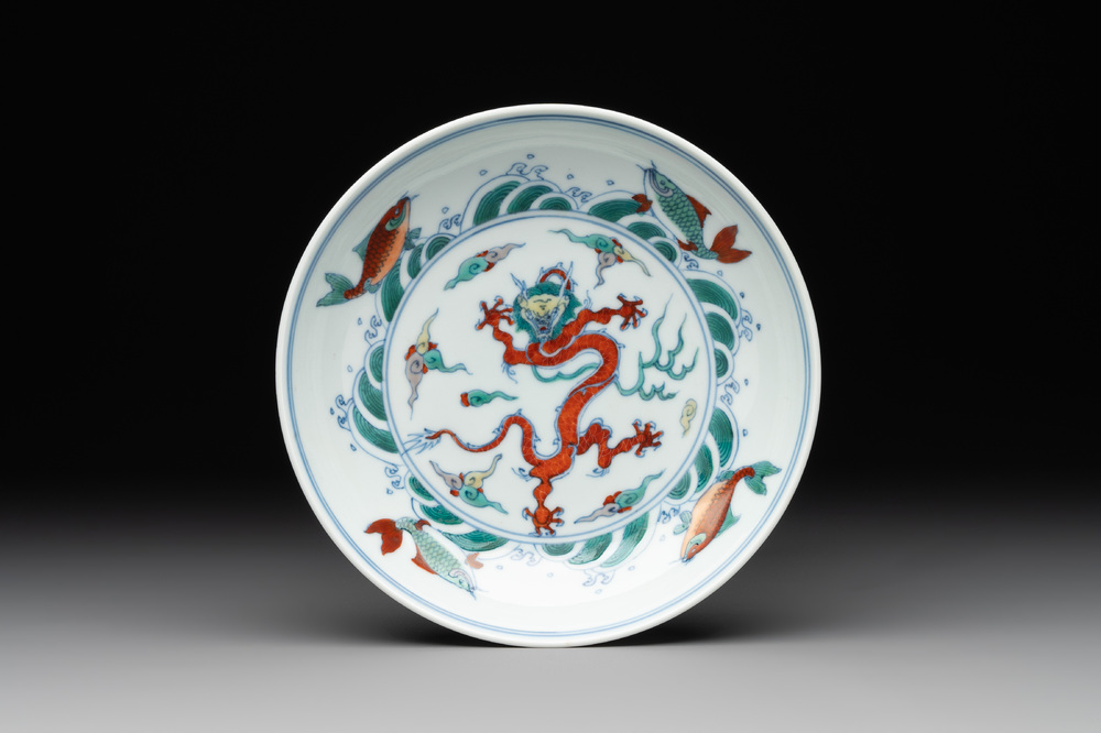 A Chinese doucai 'dragon and carps' plate, Chenghua mark, Yongzheng