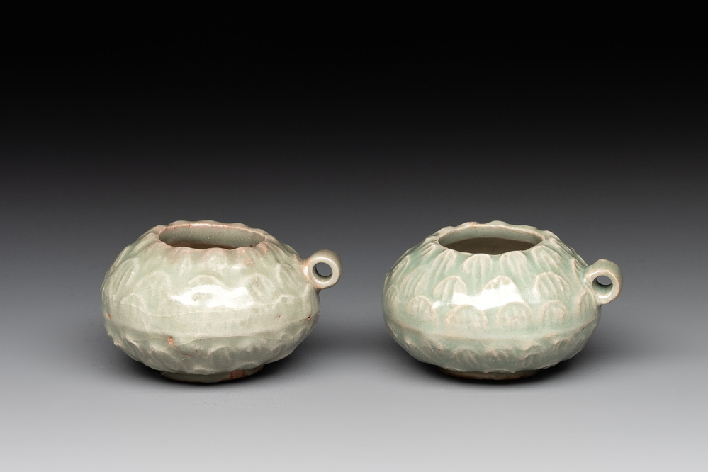 A pair of Chinese Longquan celadon bird feeders, Song