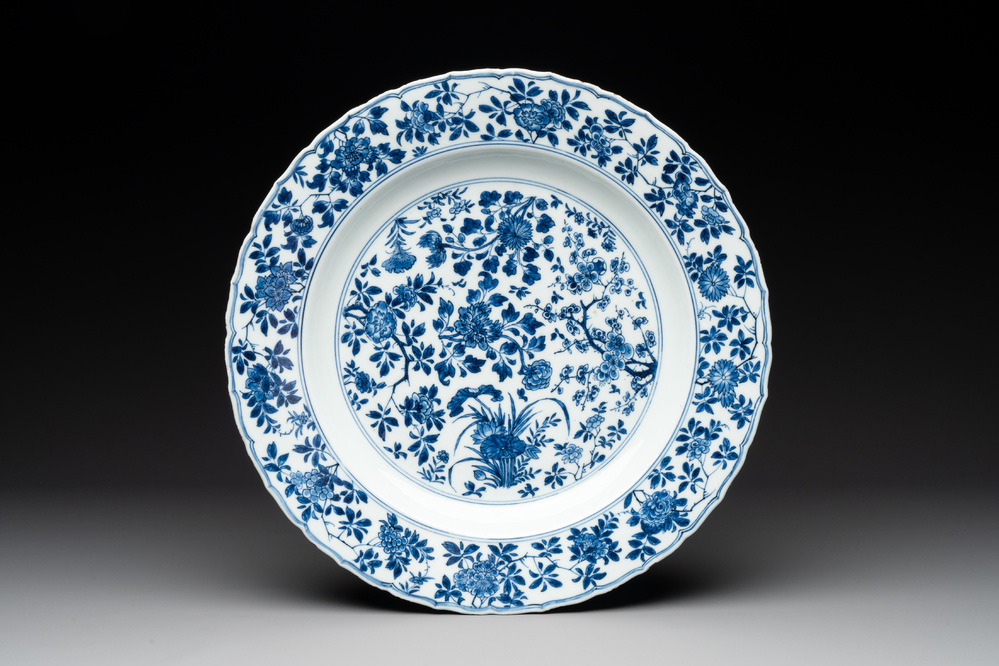 A Chinese blue and white 'four seasons' dish, Kangxi mark and of the period