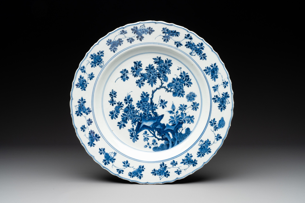 A Chinese blue and white dish with floral design, Kangxi mark and of the period