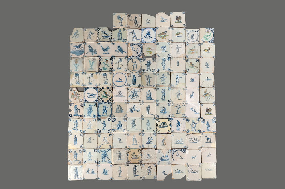 105 polychrome, blue and white Dutch Delft tiles with figures, flowers and animals, 17/18th C.