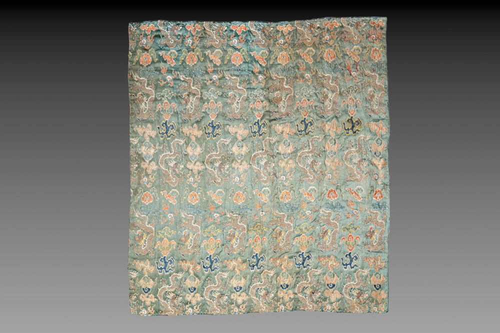 A Chinese green-ground embroidered silk panel with dragons among clouds, 18th C.