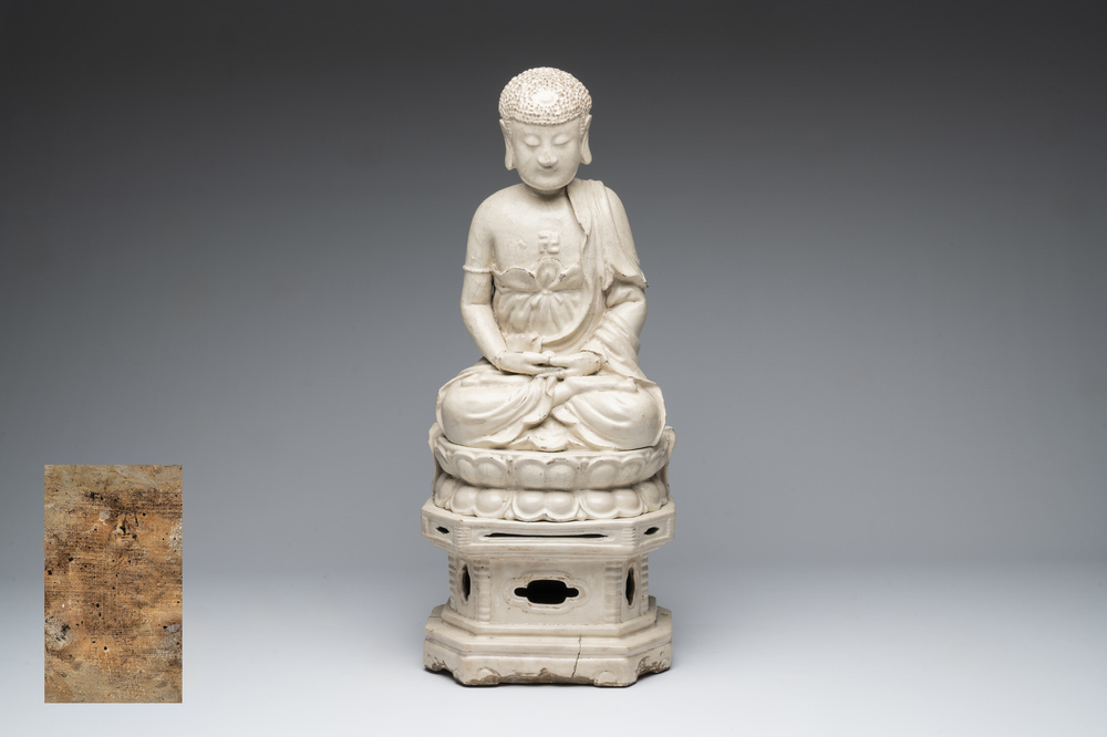 An extremely rare Chinese Swatow cream-glazed seated Buddha, Xuande mark, Ming