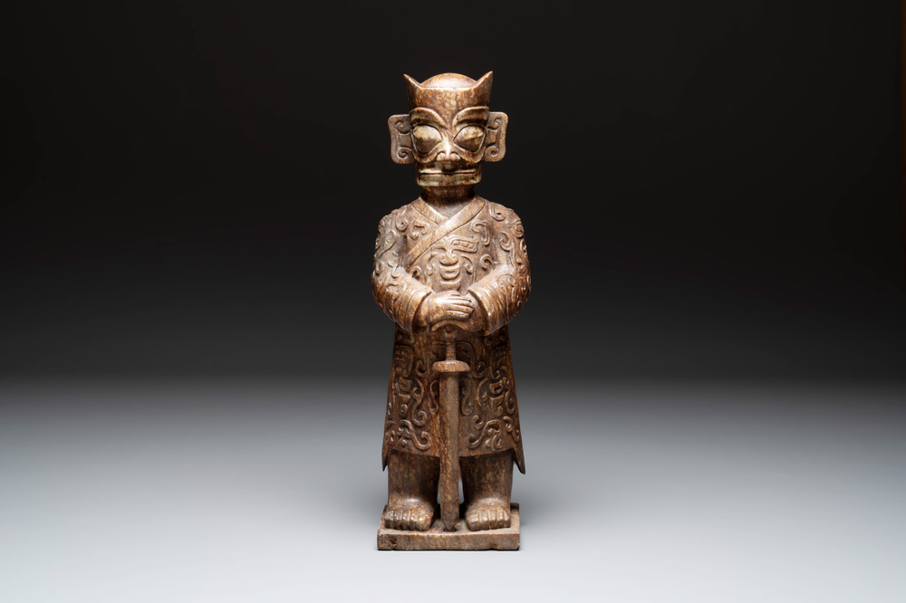 A Chinese Sanxingdui-style marble sculpture of a warrior, 20th C.