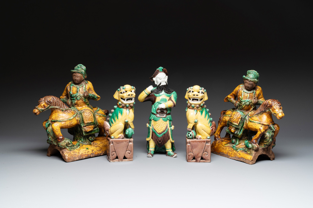 A pair of Chinese sancai-glazed rooftiles, a pair of Buddhist lions and a warrior, Ming and later