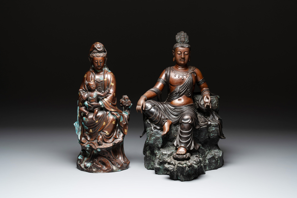 A large Chinese bronze Guanyin seated on rocks and a group of Guanyin with child, 20th C.