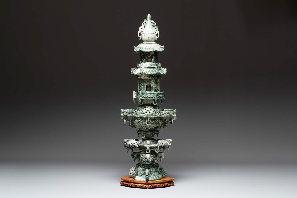 A large Chinese jade pagoda on wooden stand, 20th C.