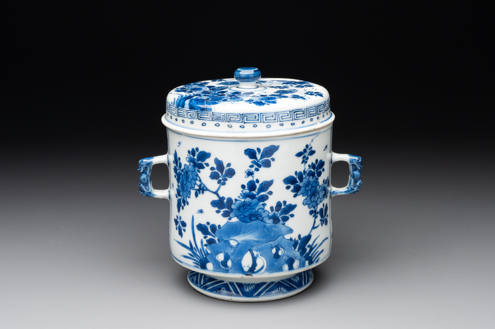 A Chinese blue and white two-handled container and cover with floral design, Kangxi