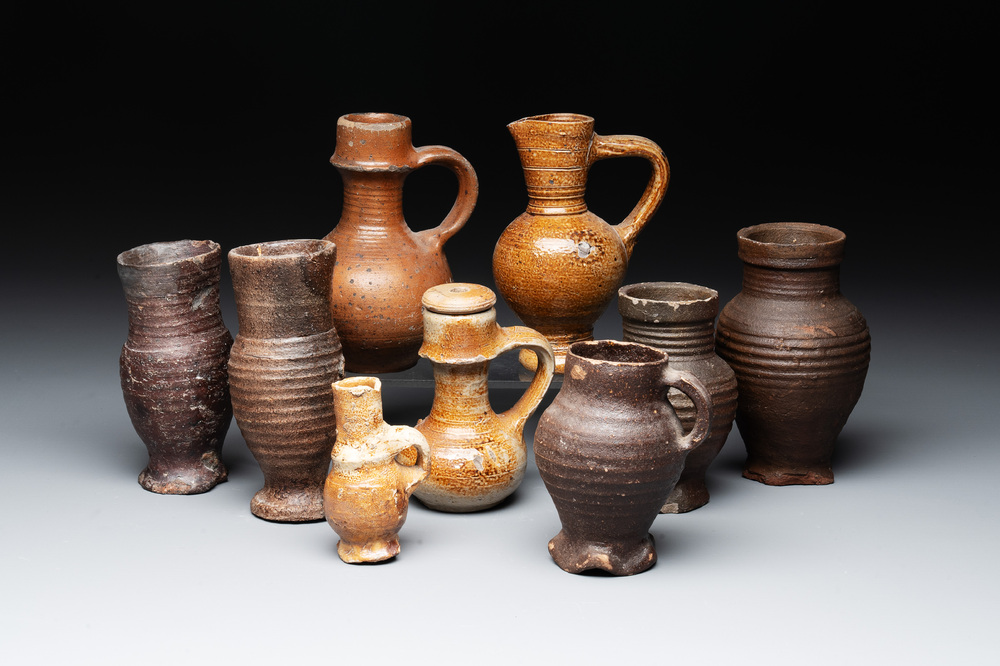 Nine German stoneware mugs and jugs, 13/16th C.