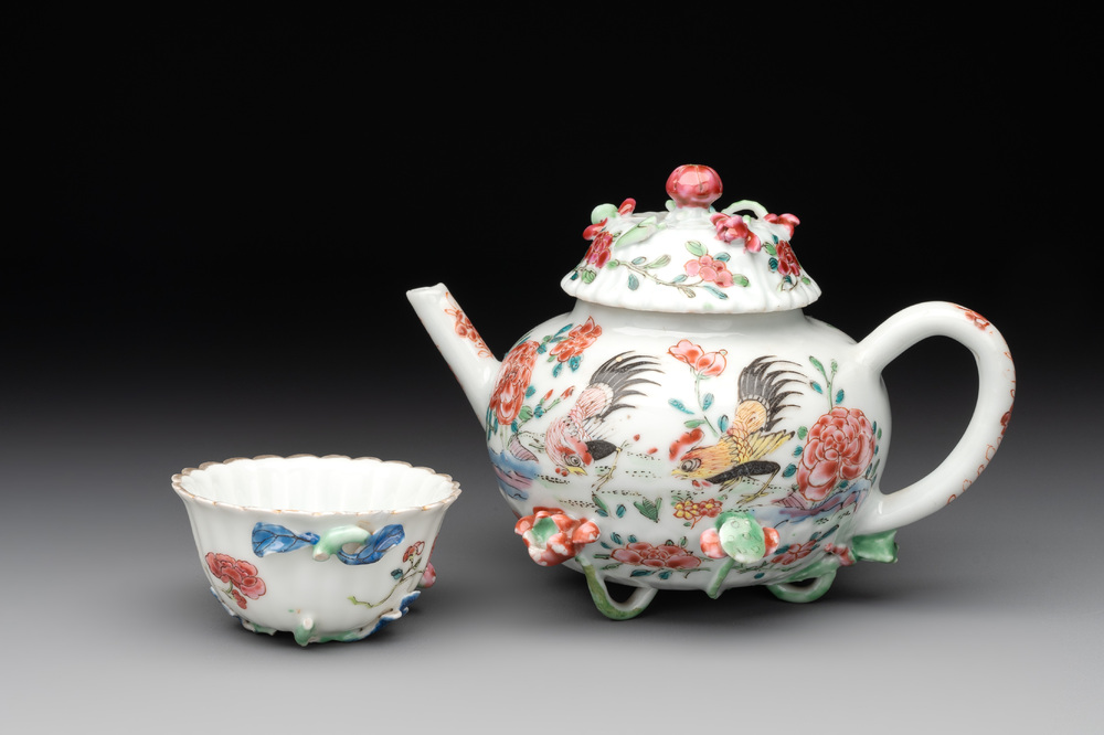 A Chinese famille rose 'rooster' teapot with applied floral design and a cup, Yongzheng/Qianlong