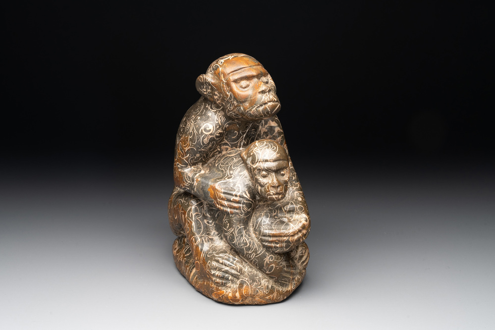 A Chinese stone group of a two monkeys, 20th C.