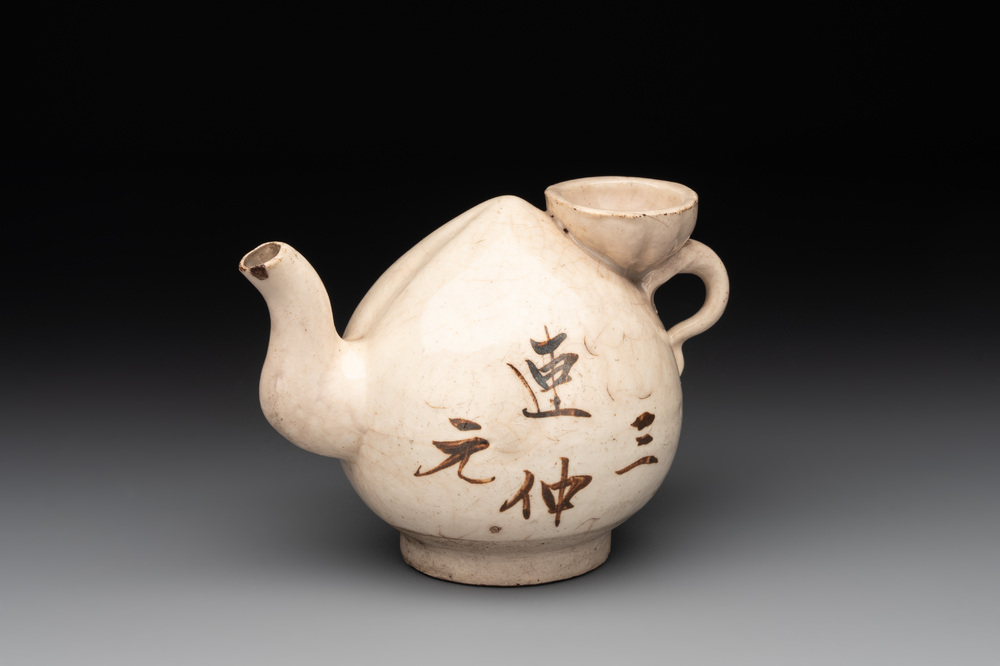 A Chinese Cizhou peach-shaped 'Lian Zhong San Yuan 連仲三元' ewer, Yuan/Ming