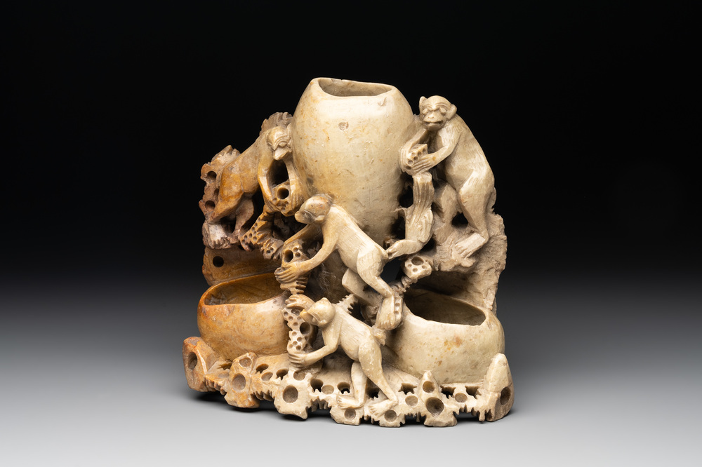 A Chinese soapstone water container with four monkeys, 20th C.