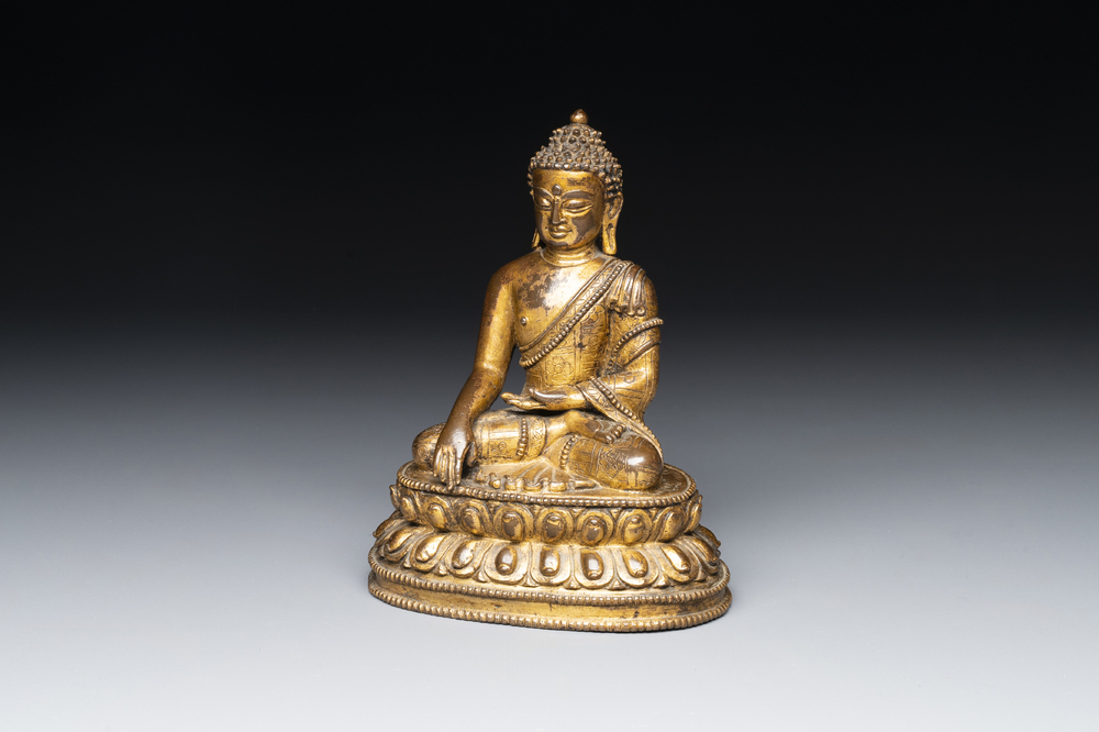 A fine Sino-Tibetan gilt bronze Buddha, 15/16th C.