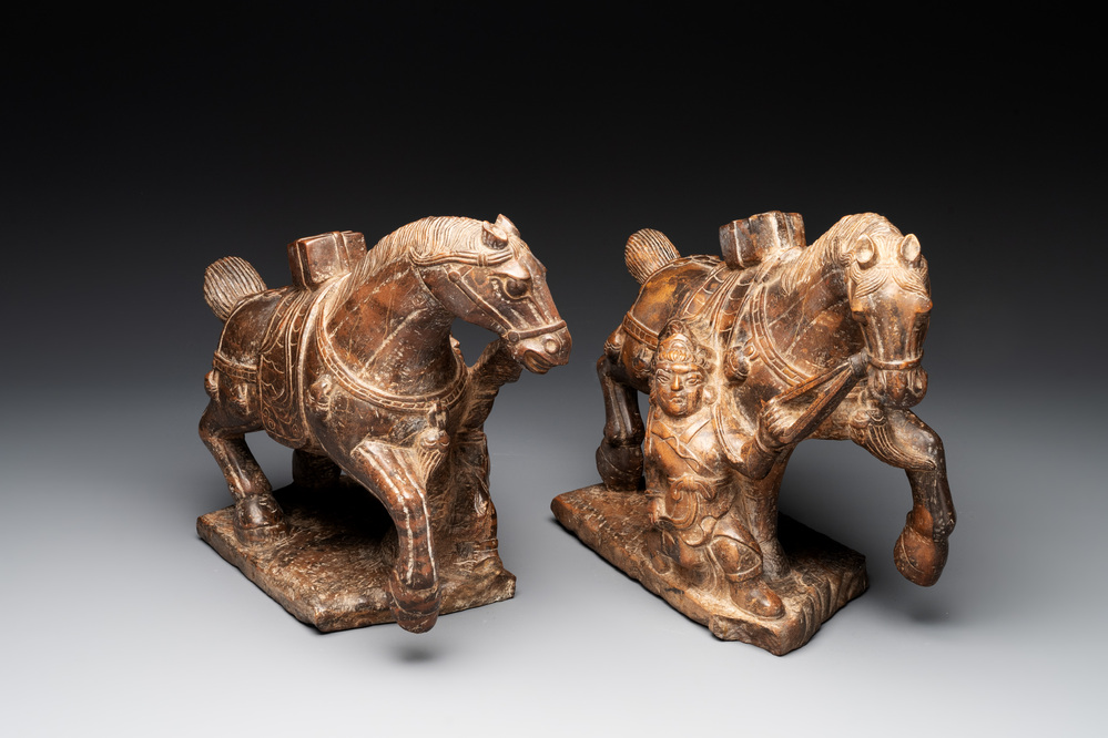 A pair of Chinese archaistic carved stone horses, 20th C.