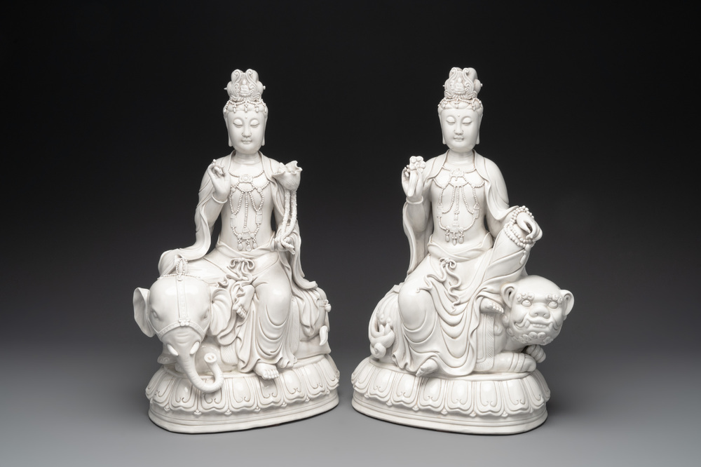 A pair of Chinese Dehua blanc de Chine Bodhisattvas seated on an elephant and a Buddhist lion, 20th C.