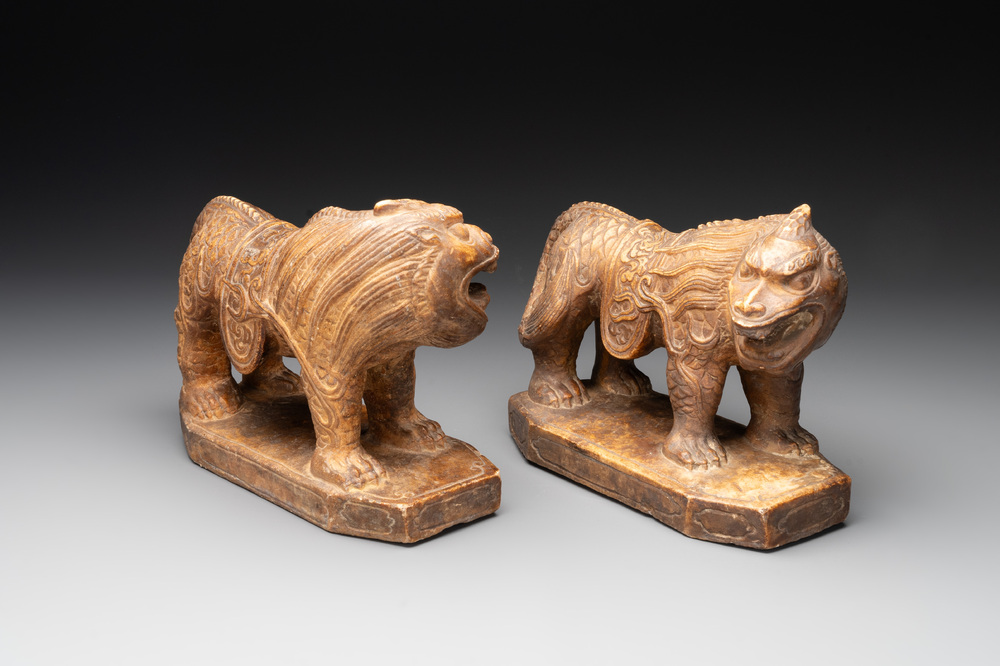 A pair of Chinese archaistic stone mythical beasts, 20th C.
