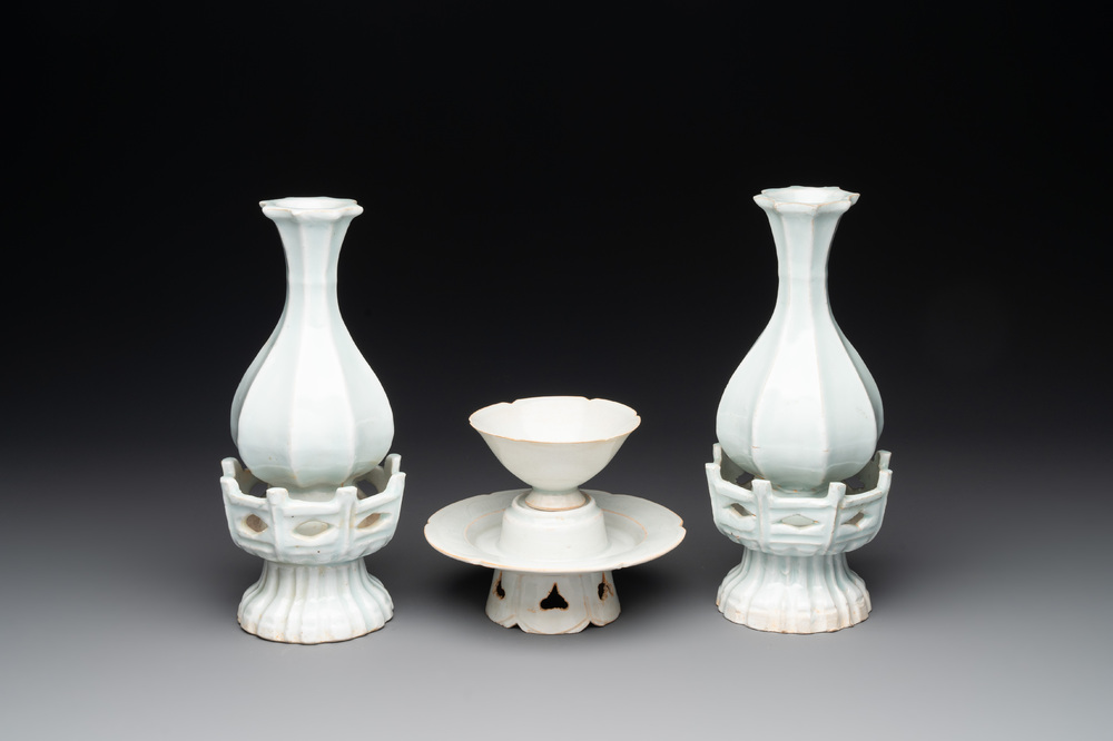 A pair of Chinese qingbai vases and a cup on a stand, 20th C.