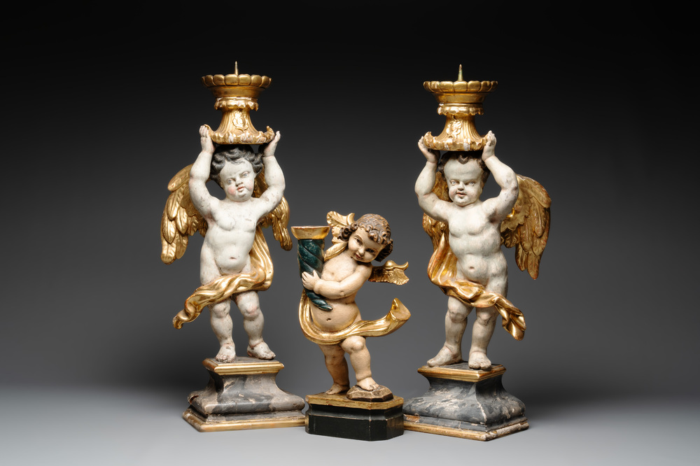 Three gilt and polychromed wooden angel-form candlesticks, Germany, 18th C.