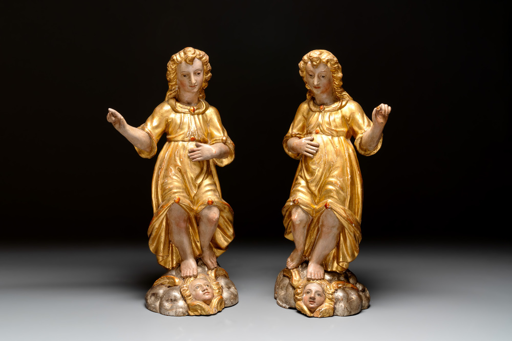 A pair of gilt and polychromed wooden figures of angels, Germany, 18th C.