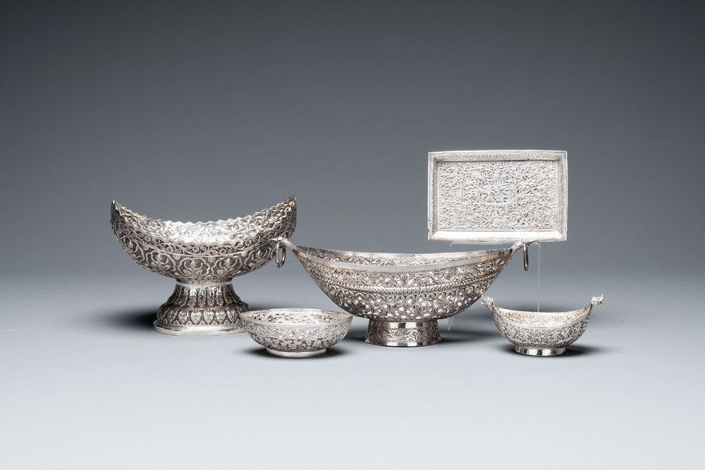 Four silver Kashkul bowls and a rectangular tray, India and Persia, 19/20th C.
