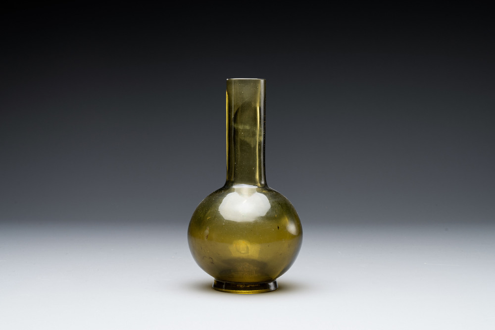 A rare Chinese translucent green Peking glass bottle vase, Qianlong mark and of the period