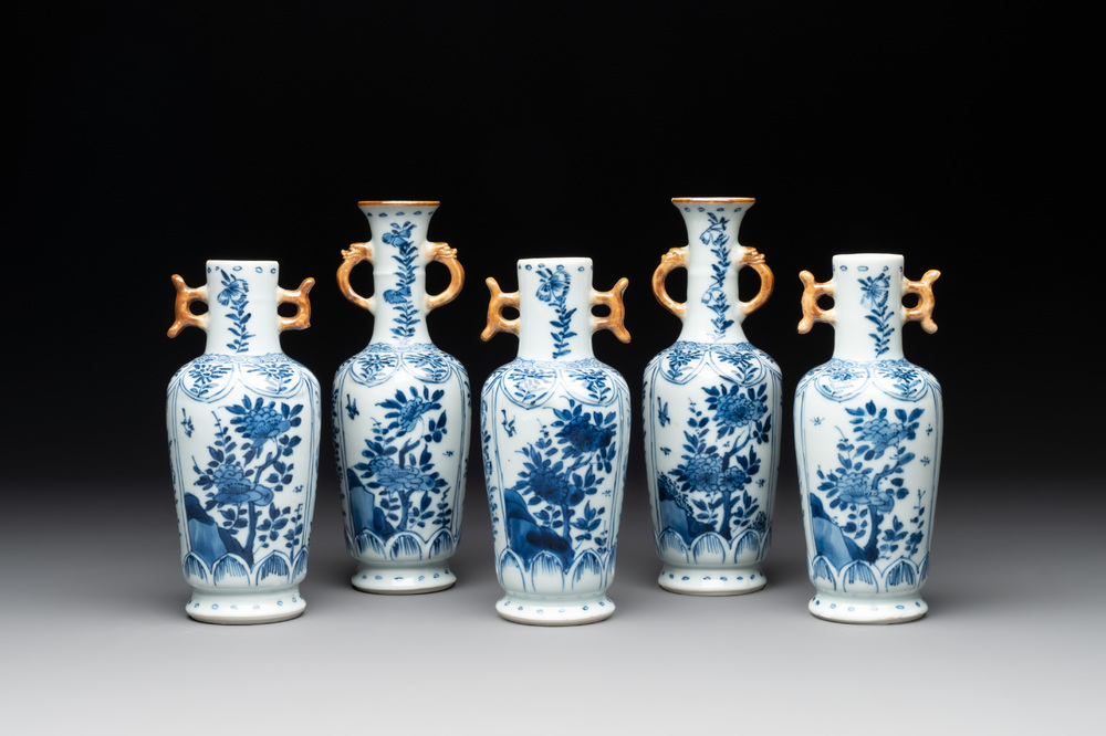 A Chinese blue and white garniture with five vases, Kangxi