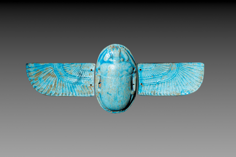 An Egyptian turquoise-glazed composition winged scarab, Ptolemaic, 4th/1st C. B.C.