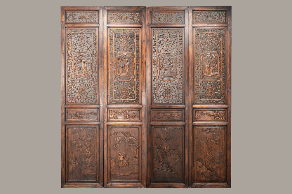 Four Chinese carved and openworked wooden doors, early 20th C.
