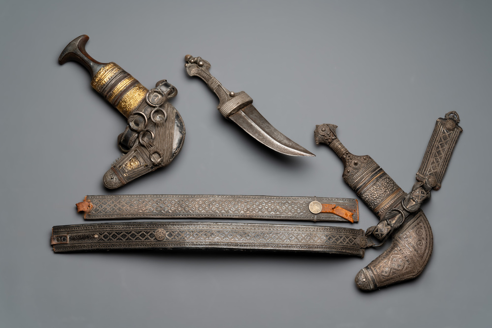 Three Omani Khanjars, one with Rhinoceros horn hilt, 19th C.