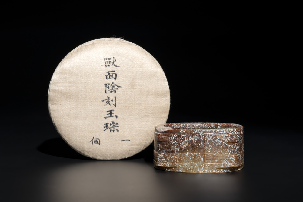 A Chinese archaic russet jade Liangzhu-style cong with a silk covered box, Liangzhu culture, Neolithic period or later