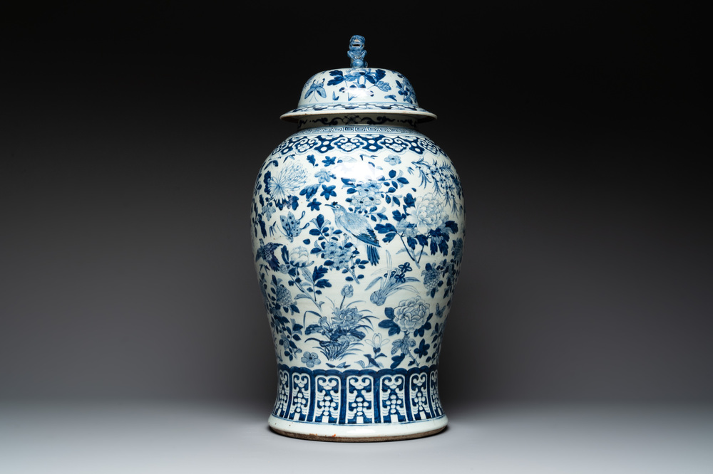 A large Chinese blue and white 'birds among blossoming branches' vase and cover, 19th C.