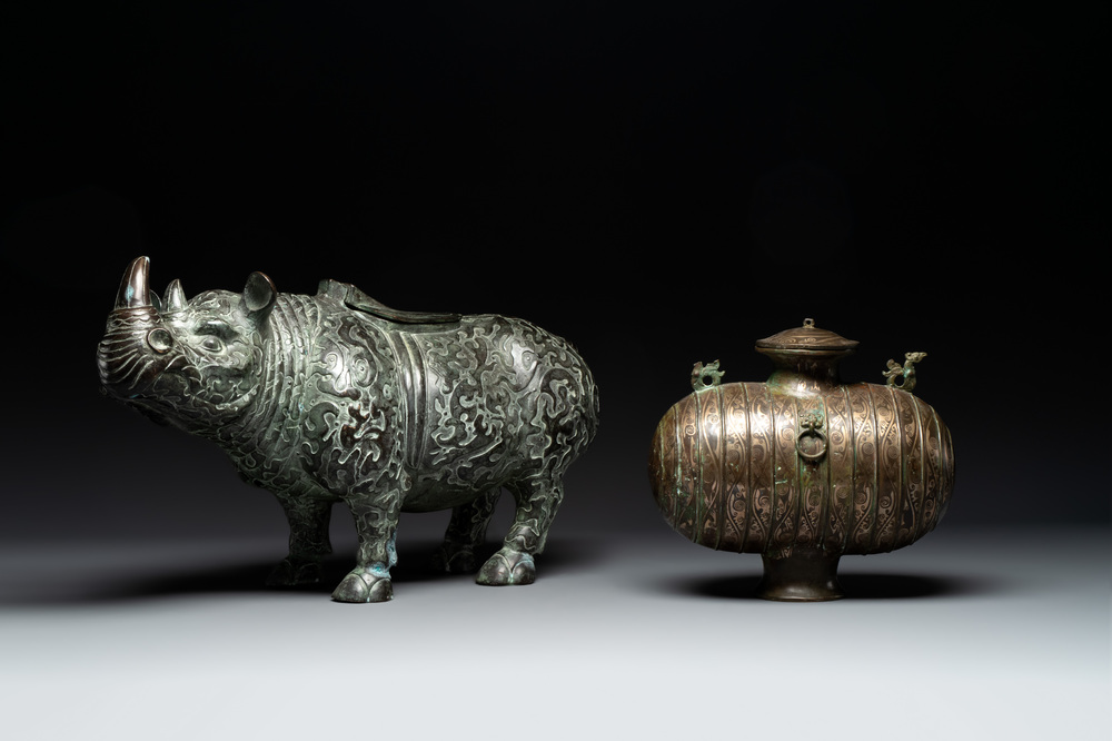 Two large Chinese archaistic bronze rhino- and melon-form vessels, 20th C.