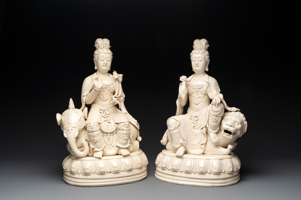 A pair of large Chinese Dehua blanc de Chine Bodhisattvas seated on an elephant and a Buddhist lion, 20th C.