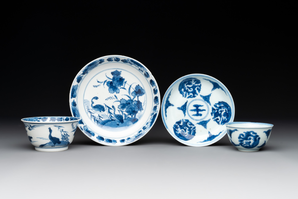 Two Chinese blue and white cups and saucers, Kangxi/Yongzheng