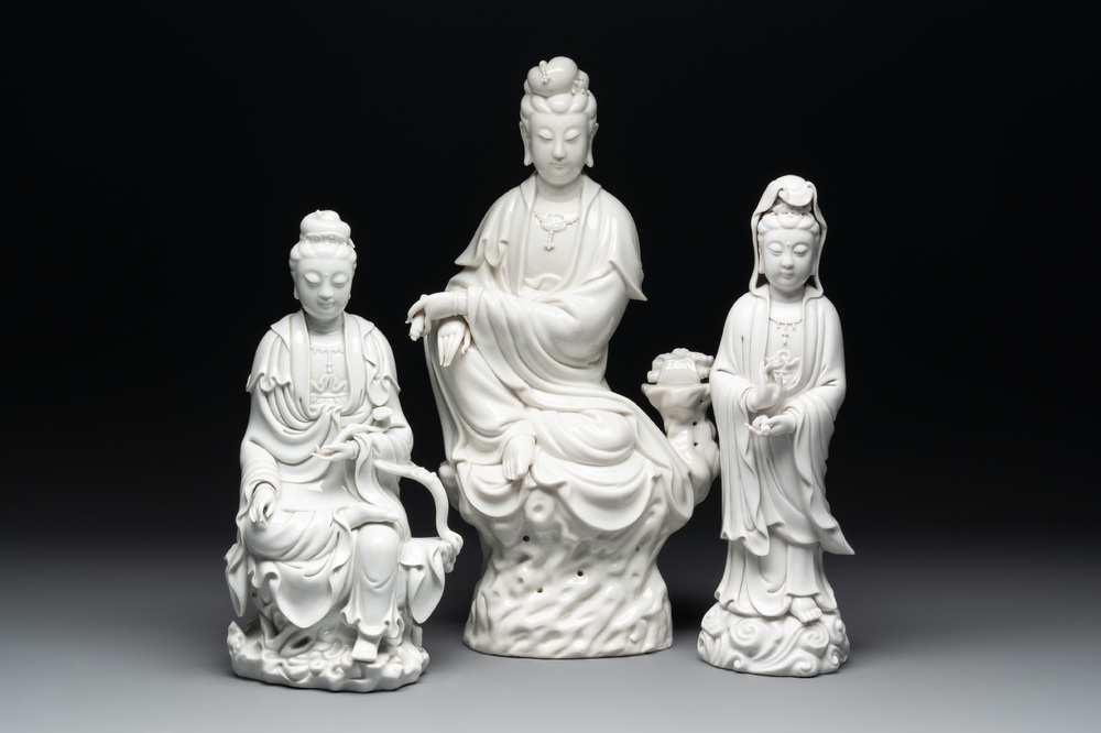 Three Chinese Dehua blanc de Chine figures of Guanyin, 20th C.