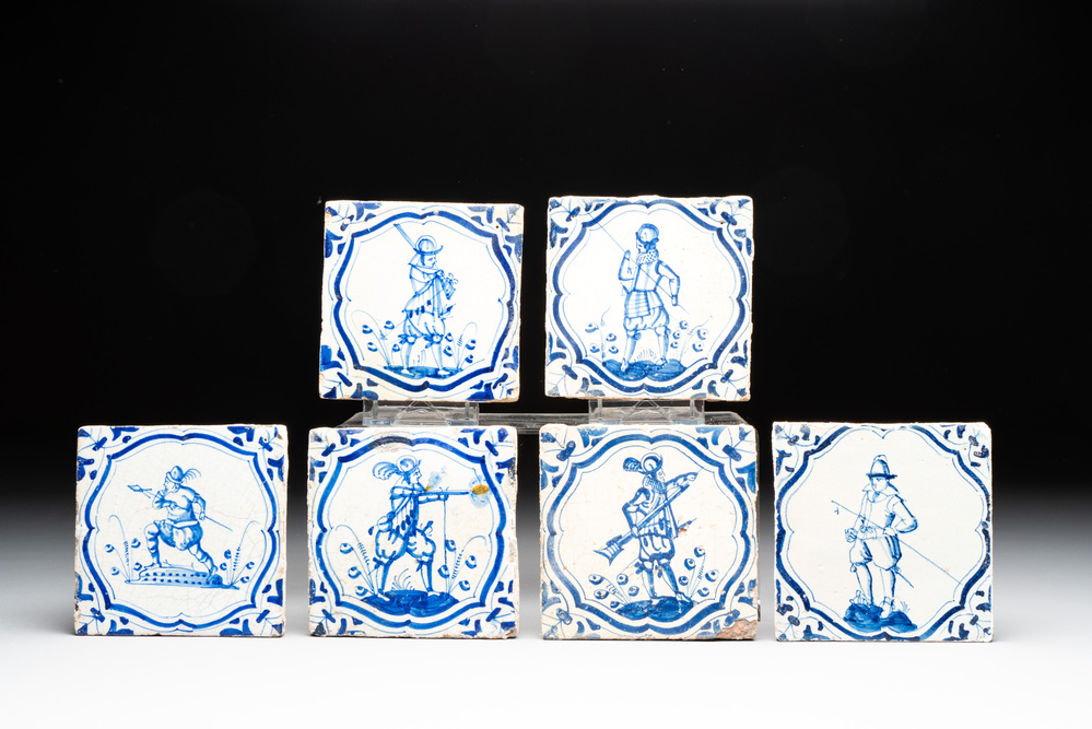 Six blue and white Dutch Delft 'accolade borders' 'soldier' tiles, 17th C.