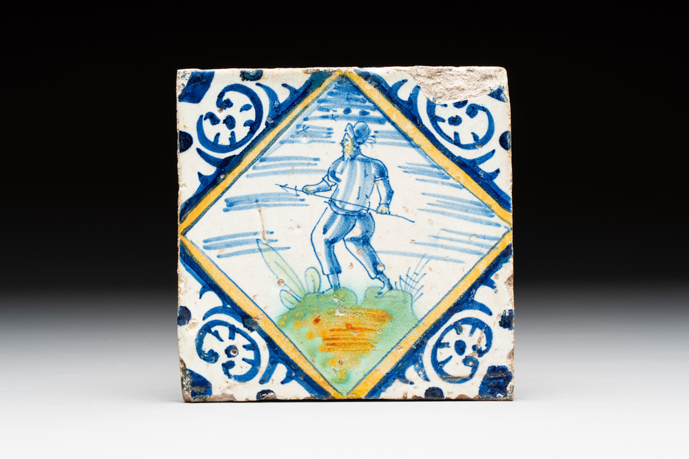 A polychrome Dutch Delft maiolica 'hunter with spear' diamond tile, ca. 1600
